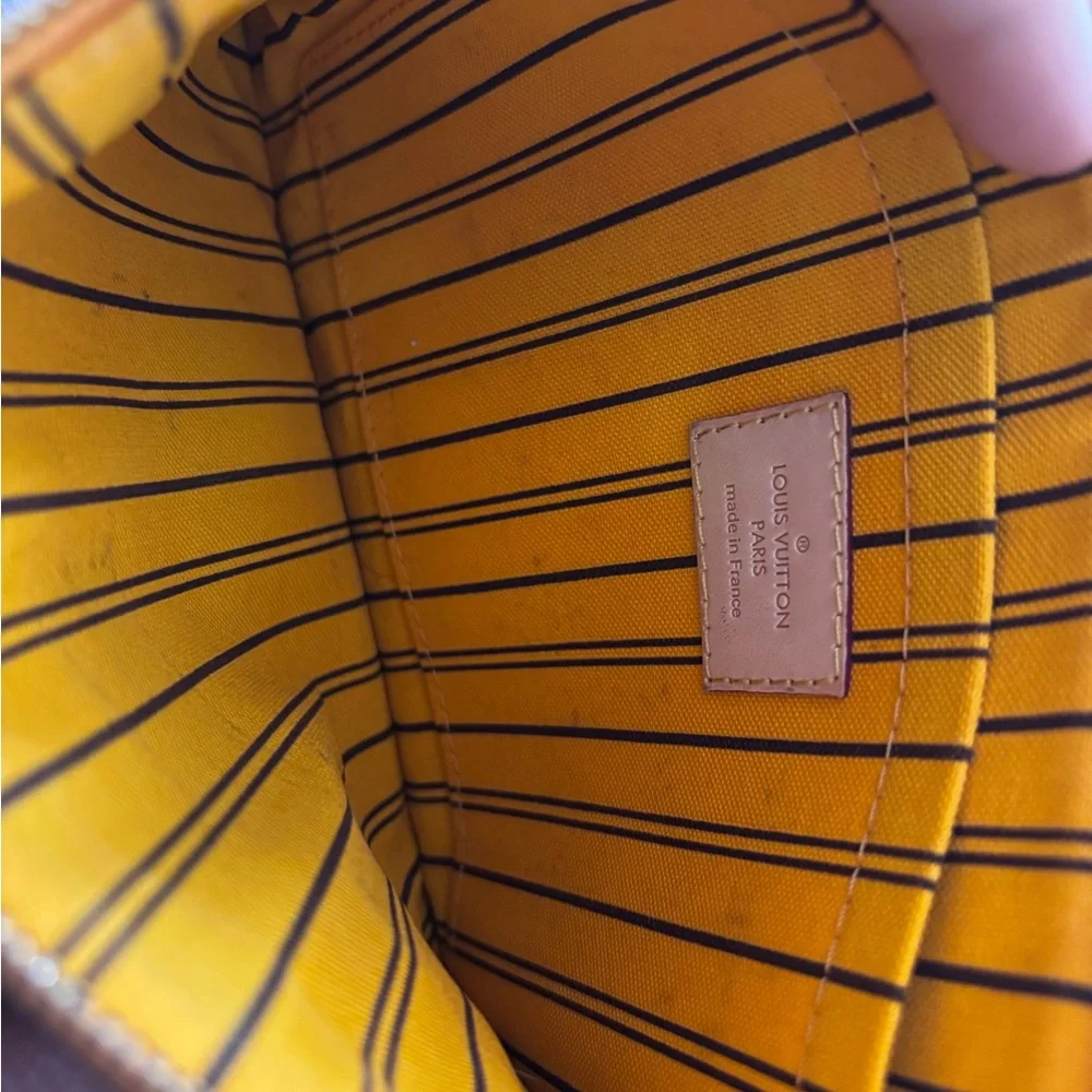 Authentic Louis Vuitton mimosa yellow lining Neverfull GM pouch wristlet